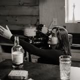 a lady behind the lens